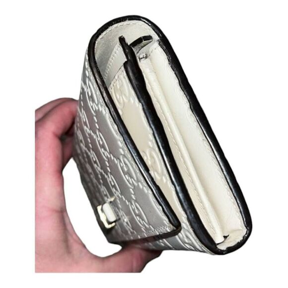 GUCCI Guccisima White Calfskin
Leather Bow Wallet Full Inclusion - Picture 9 of 13